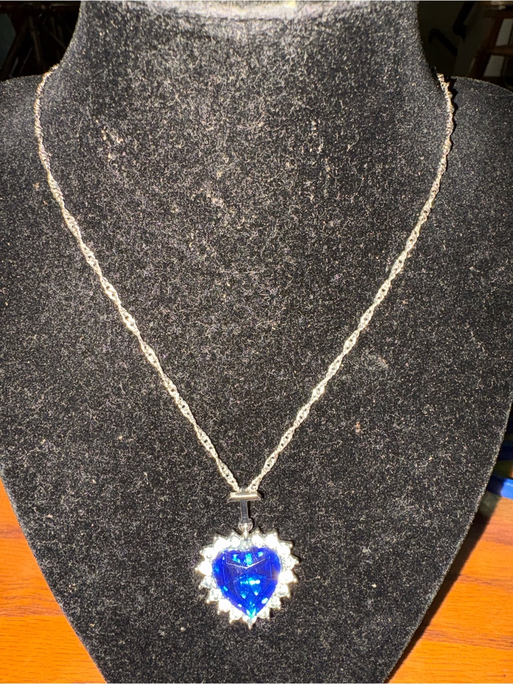 Women’s Heart Pendant Necklace with Blue Crystal blue is plastic. 10 1/2 inc